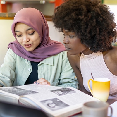 photo of women learning new language